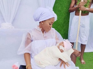 mzbel radiates elegance at her daughter's outdooring ceremony