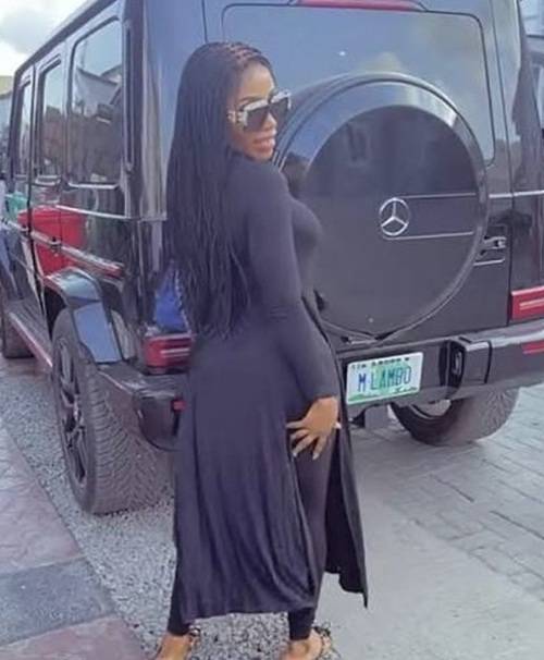 mercy eke unveils matte black g wagon, stuns in sculptural maroon birthday look